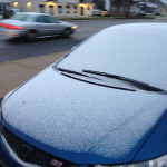 Snow covers a car in Elsmere this morning. (Photo: DFN)