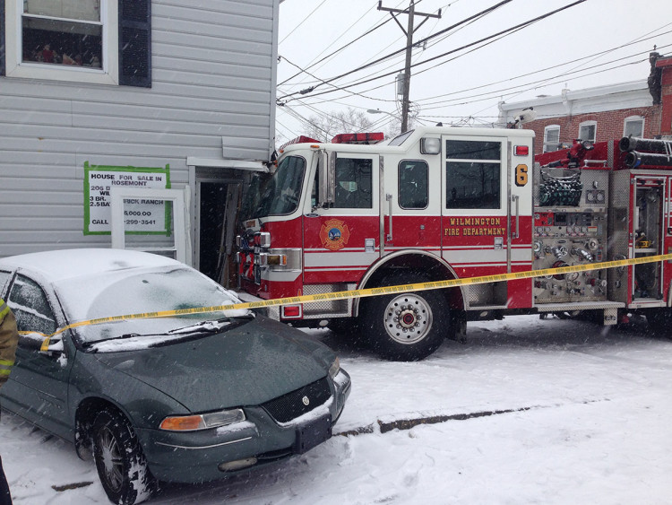 Firetruck slides into Wilmington building in Delaware