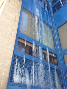 Water from broken sprinkler system streamed out upper windows at Bayard Middle School, then froze. (Photo: DFN)