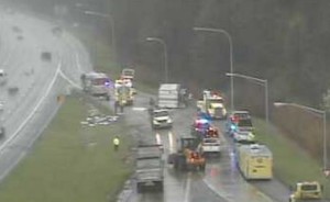 Crews work to remove overturned trailer on ramp from Route 1 and Churchmans Road to southbound Interstate 95 at 9:30 a.m., hours after crash. (Photo: DelDOT traffic cam)