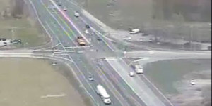 Highway crews blocks turn lanes from U.S. 50 to Route 404 at right.
