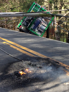 Wires set fire to pavement on Mill Creek Road. (Photo: DFN)