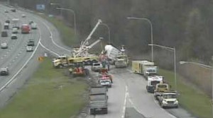 Cranes are used as crews work to remove overturned trailer on ramps from Churchmans Road and Route 1 onto southbound Interstate 95 at 2:30 p.m.