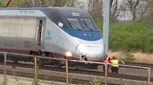 Amtrak Acela train, with damage to its right front, waits on the tracks after fatal accident Thursday afternoon near Claymont train station. (Photo: Delaware Free News)