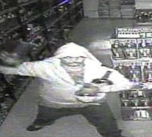 Surveillance photo from liquor store burglary released by state police.