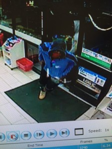 Surveillance image from 7-Eleven robbery released by Dover police