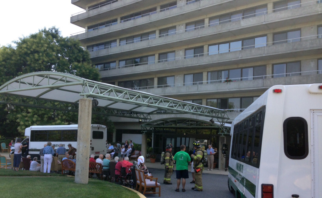 Evacuated residents wait outside Cokesbury Village  building entrance. (Photo: Delaware Free News)