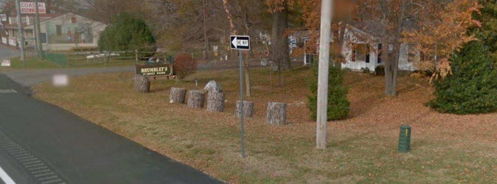 Logs and rock placed at entrance to Brumbley's Family Park on Route 1, opposite Route 5 stop sign (Photo: Google maps)