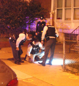 Detectives examine evidence in 800 block of Vandever Ave. (Photo: Delaware Free News)