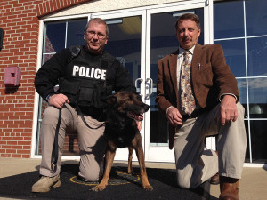 Bob D'Orazio (right) and his wife Theresa donated $1,000 to provide a vest for K-9 Cooper, shown with his handler Officer Paul Allston. (Photo: Delaware Free News)