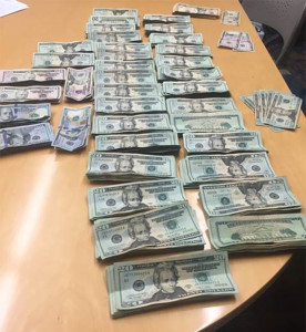 Cash seized at home in Collins Park. (Photo: New Castle County police)