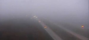 Dense fog is visible just before sunrise on Route 1 at the north Dover exit. (Photo: DelDOT traffic cam)