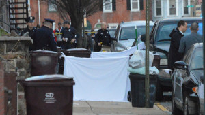 Police shielded homicide scene with sheets in the 200 block of N. Connell St. (Photo: Delaware Free News)