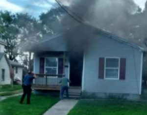 Firefighter Greg Adkins enters burning home. (Photo: Laurel Fire Department)