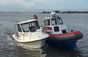 Capsized boat was recovered Sunday morning by TowBoatUS out of Ocean City, Maryland. (Photo: TowBoatUS Ocean City)