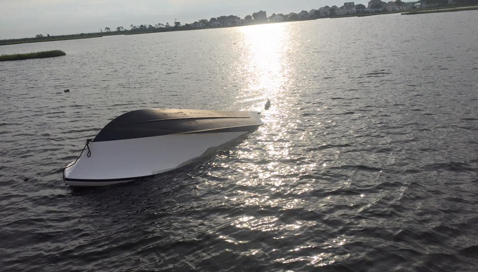 Capsized boat was recovered Sunday morning. (Photo: TowBoatUS Ocean City)