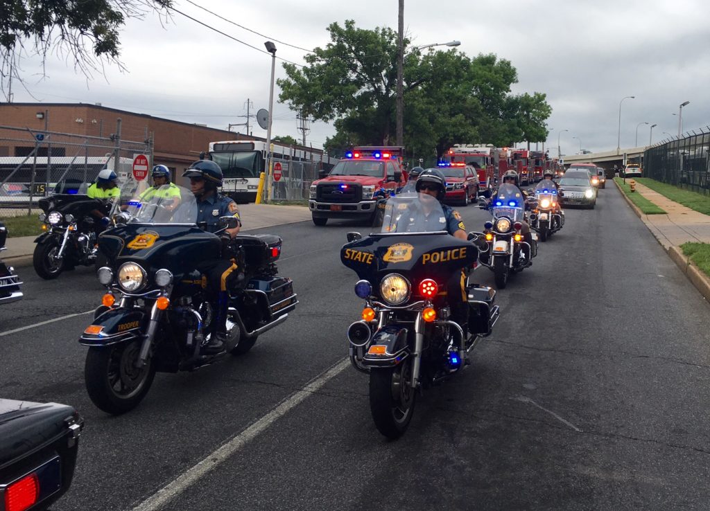 Emergency crews escort the body of volunteer firefighter Tim McClanahan after leaving medical examiner's office. (Photo: Delaware Free News)