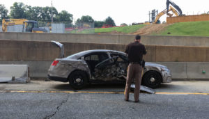 Police car and dump truck pulling trailer collided on northbound U.S. 13 beneath Interstate 295. (Photo: Delaware Free News)