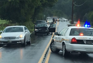 Crash on Walther Road happened as cars were trying to avoid flooded roadway near U.S. 40 in Bear. (Reader-submitted photo courtesy Jennifer Jankowski)