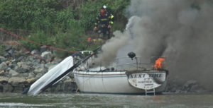 Sailboat "Next Time" burns on the Chesapeake & Delaware Canal. (Photo: Delaware City Fire Company)
