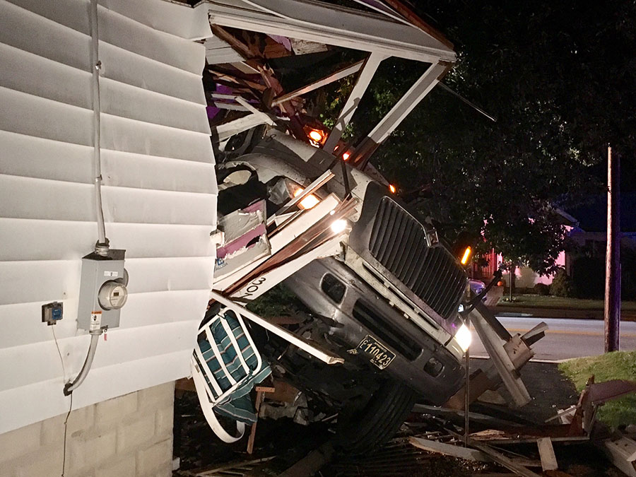 Tractor-trailer hit home in 300 block of Moores Lane, New Castle. (Photo: Delaware Free News)