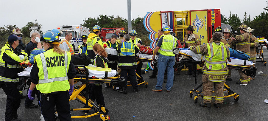 Emergency workers treat injured at Jolly Trolley crash scene. (Photo: Rehoboth Beach Volunteer Fire Company)