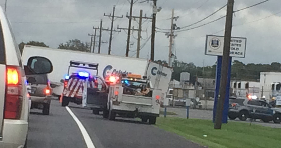 A tractor-trailer blocks the eastbound lane of Route 14 (Milford-Harrington Highway) on the west side of Milford. (Photo: Delaware Free News)