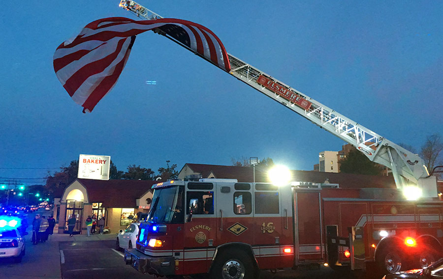 Serpe and Sons Bakery at 1411 Kirkwood Highway in Elsmere reopened with an Elsmere Fire Company ladder truck raising the flag. (Photo: Delaware Free News)