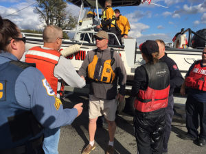 Couple was returned to shore on Good Will Fire Company boat after their sailboat overturned in Delaware River. (Photo: Delaware Free News)