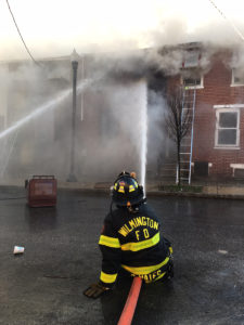 Fire began in vacant home at 44 E. 22nd St. in Wilmington and spread to adjacent dwellings. (Photo: Delaware Free News)