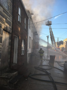 Fire began in vacant home at 44 E. 22nd St. in Wilmington and spread to adjacent dwellings. (Photo: Delaware Free News)