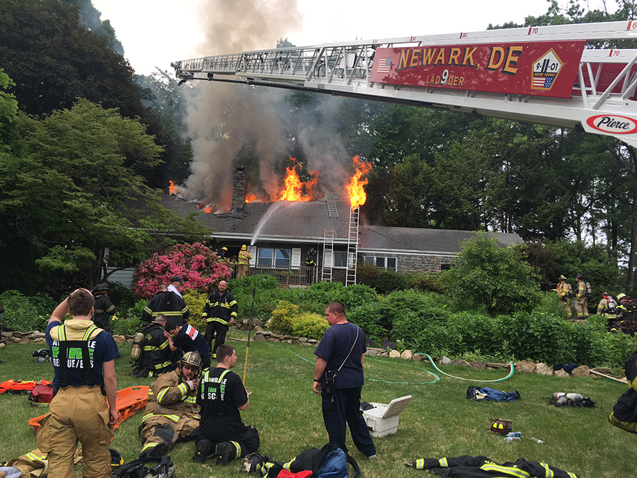 Firefighters battle flames at home on Neptune Drive in North Star. (Photo: Delaware Free News)