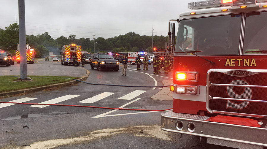 Pickup truck crashed into Analtech building after colliding with another truck at South Chapel St. (Route 72) and Blue Hen Drive. (Photo: Delaware Free News)