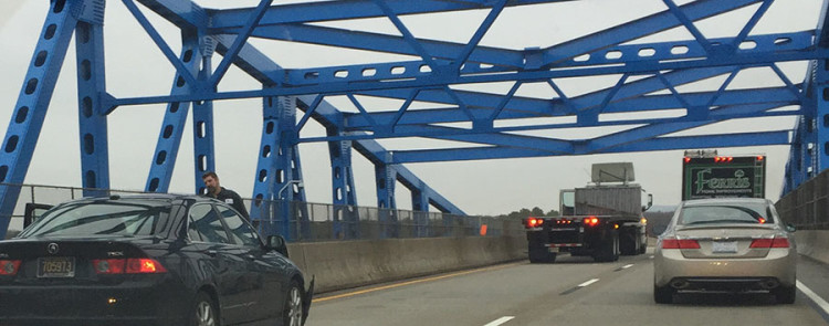 Car at left and tractor-trailer were involved in crash on Summit Bridge. (